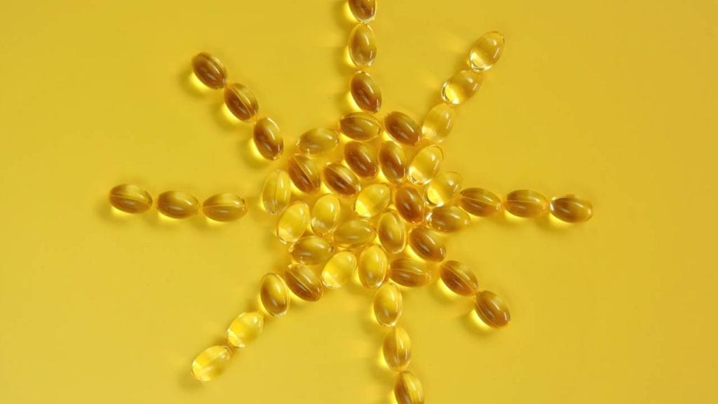 cápsulas amarelas de vitamina d