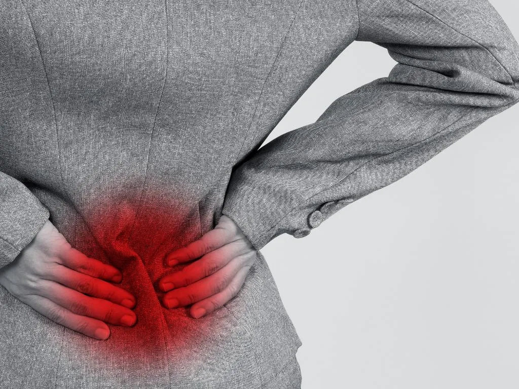 Mulher com dor local relacionada a miosite